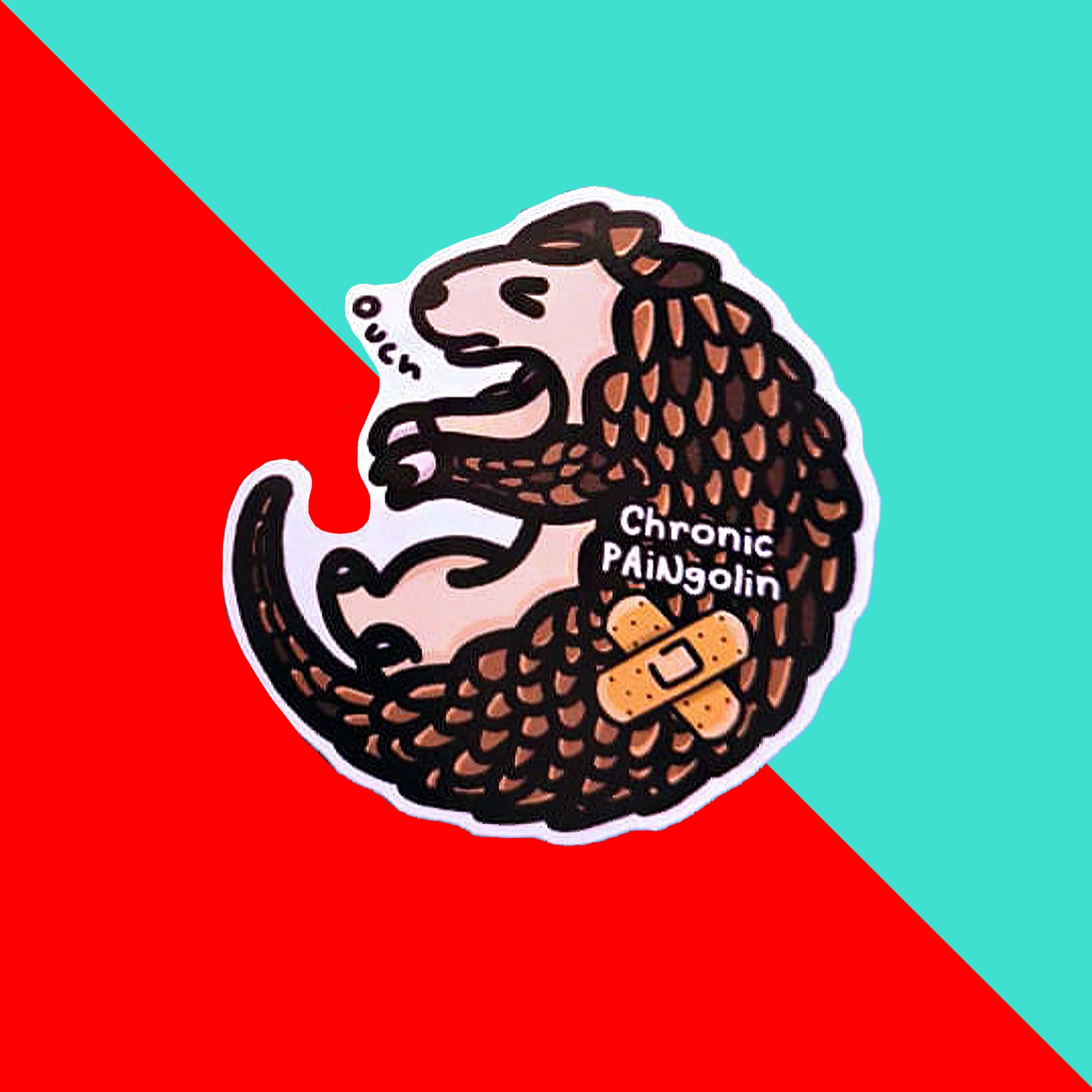 Chronic Paingolin Sticker - Chronic Pain on a red and blue background. The pangolin shaped sticker has a frustrated expression whilst curled up with a double cross bandaid plaster and text reading 'chronic paingolin' on its side, next to its mouth reads 'ouch'. The design was created to raise awareness for chronic pain.